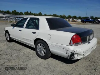2005 Ford Police Interceptor z VIN 2FAFP71W95X144873, wystawiony jako Copart lot #58260905 z przebiegiem 135 986 mil mil oraz Szkoda całkowita • Salvage title. Historia ofert i sprzedaży dostępna na DreamBid. Obrazek 2.