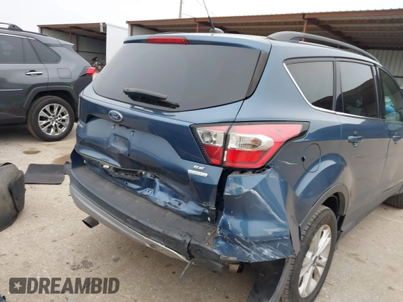 2018 Ford Escape SE with VIN 1FMCU0GD0JUC58115, listed as a IAAI auction lot 41578309 with 76,162 mi miles. Bid and sale history available at carsss.com. Image 6.
