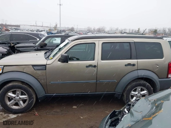2007 Dodge Nitro SXT with VIN 1D8GU28K37W554484, listed as a IAAI auction lot 41565252 with 156,717 mi miles. Bid and sale history available at carsss.com. Image 14.