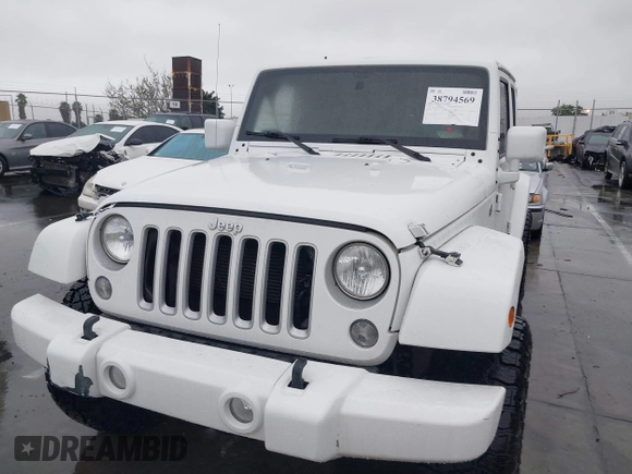 2016 Jeep Wrangler Unlimited Sahara with VIN 1C4HJWEG8GL240950, listed as a IAAI auction lot 41443059 with Not provided miles and . Bid and sale history available at DreamBid. Image 6.