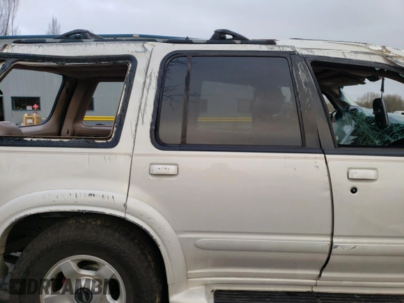 2001 Ford Explorer z VIN 1FMZU85P51ZA00343, wystawiony jako Copart lot #85793084 z przebiegiem Nie podano mil oraz Nie do naprawy • Non repairable. Historia ofert i sprzedaży dostępna na DreamBid. Obrazek 12.
