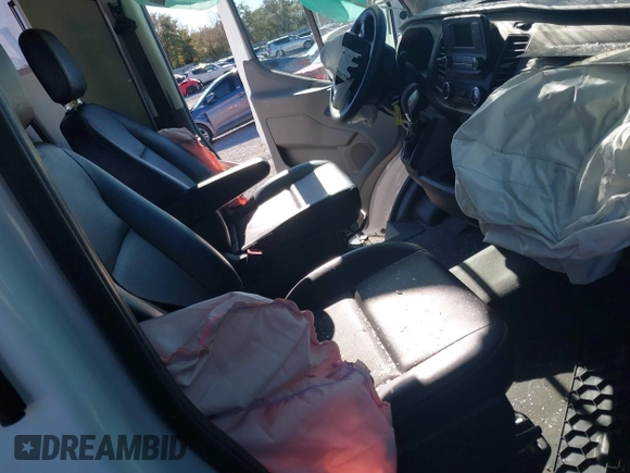 2022 Ford Transit Cargo with VIN 1FTBW3U85NKA01097, listed as a IAAI auction lot 41076643 with 24,786 mi miles and . Bid and sale history available at DreamBid. Image 5.