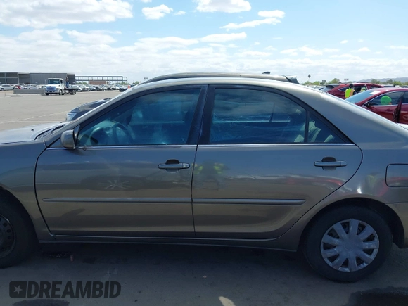 2004 Toyota Camry LE with VIN 4T1BE32K44U825561, listed as a IAAI auction lot 42051914 with 244,521 mi miles and . Bid and sale history available at DreamBid. Image 13.
