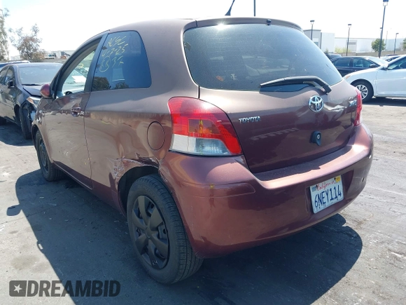 2010 Toyota Yaris with VIN JTDJT4K38A5324103, listed as a IAAI auction lot 41964619 with 149,874 mi miles. Bid and sale history available at carsss.com. Image 3.