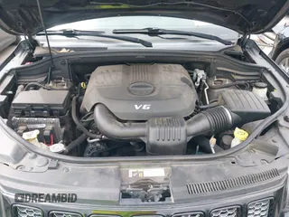 2015 Jeep Grand Cherokee Altitude z VIN 1C4RJFAGXFC659990, wystawiony jako IAAI lot #42331922 z przebiegiem 121 379 mil mil oraz . Historia ofert i sprzedaży dostępna na DreamBid. Obrazek 10.