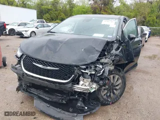 2023 Chrysler Pacifica Hybrid Touring L with VIN 2C4RC1L71PR554435, listed as a IAAI auction lot 41901500 with 53,373 mi miles. Bid and sale history available at carsss.com. Image 6.