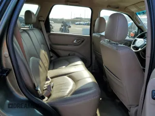 2002 Mazda Tribute LX with VIN 4F2YU08112KM16716, listed as a Copart auction lot 55095645 with 113,885 mi miles and Salvage Title. Bid and sale history available at DreamBid. Image 11.