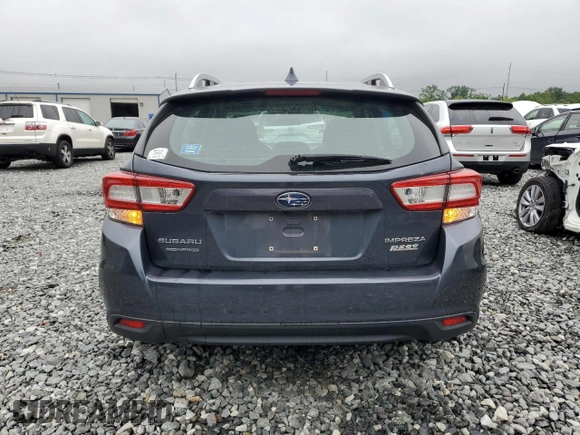 2017 Subaru Impreza Premium z VIN 4S3GTAD6XH3703075, wystawiony jako Copart lot #59928165 z przebiegiem 95 866 mil mil oraz Szkoda całkowita • Salvage title. Historia ofert i sprzedaży dostępna na DreamBid. Obrazek 6.
