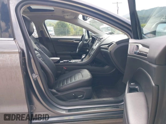 2014 Ford Fusion SE Hybrid with VIN 3FA6P0LU3ER152517, listed as a IAAI auction lot 42801042 with 209,898 mi miles and . Bid and sale history available at DreamBid. Image 5.