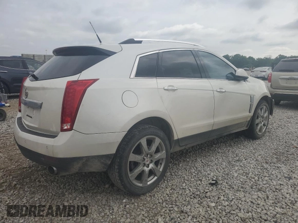 2012 Cadillac SRX Performance Collection z VIN 3GYFNBE32CS615988, wystawiony jako Copart lot #61198415 z przebiegiem 156 135 mil mil oraz Szkoda całkowita • Salvage title. Historia ofert i sprzedaży dostępna na DreamBid. Obrazek 3.