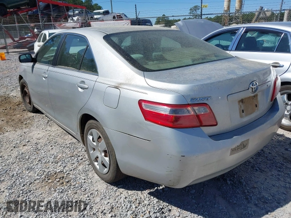 2007 Toyota Camry CE with VIN 4T1BE46K57U643632, listed as a IAAI auction lot 41851036 with 300,010 mi miles. Bid and sale history available at carsss.com. Image 3.