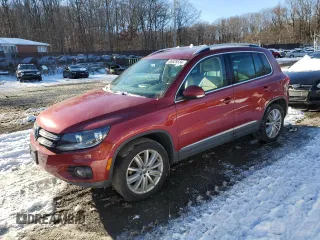 2014 Volkswagen Tiguan S z VIN WVGBV3AX5EW036354, wystawiony jako Copart lot #86829534 z przebiegiem 120 616 mil mil oraz Szkoda całkowita • Salvage title. Historia ofert i sprzedaży dostępna na DreamBid. Obrazek 1.