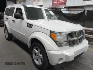 2007 Dodge Nitro SLT with VIN 1D8GU58K97W583408, listed as a IAAI auction lot 41653696 with 124,449 mi miles. Bid and sale history available at carsss.com. Image 1.