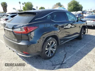2021 Lexus RX 450h with VIN 2T2HGMDA9MC067213, listed as a Copart auction lot 48599255 with 28,234 mi miles and Salvage title. Bid and sale history available at DreamBid. Image 3.