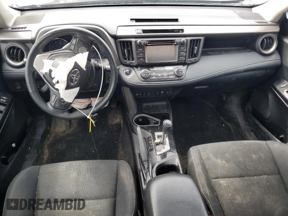 2018 Toyota RAV4 XLE with VIN 2T3RFREV2JW841670, listed as a Copart auction lot 50700675 with Not Provided miles and Salvage Title. Bid and sale history available at DreamBid. Image 8.