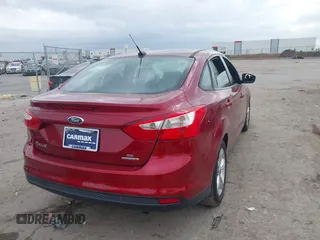 2014 Ford Focus SE with VIN 1FADP3F21EL340728, listed as a IAAI auction lot 41159162 with 125,919 mi miles. Bid and sale history available at carsss.com. Image 4.