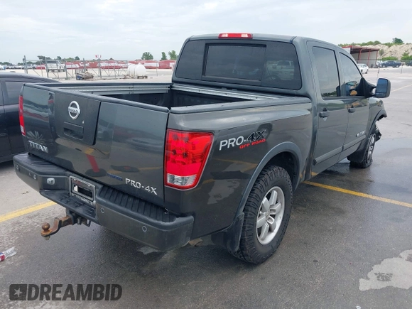 2010 Nissan Titan Pro-4X with VIN 1N6BA0EC9AN323943, listed as a IAAI auction lot 42795482 with 200,453 mi miles and . Bid and sale history available at DreamBid. Image 4.