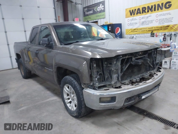 2014 Chevrolet Silverado 1500 LT with VIN 1GCVKREC9EZ240612, listed as a IAAI auction lot 41108566 with 200,625 mi miles and . Bid and sale history available at DreamBid. Image 1.