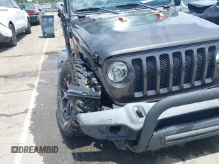 2019 Jeep Wrangler Unlimited Sport S with VIN 1C4HJXDN4KW577273, listed as a IAAI auction lot 42435847 with 69,403 mi miles and . Bid and sale history available at DreamBid. Image 17.