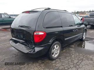 2007 Dodge Caravan SXT with VIN 1D4GP45R87B161237, listed as a IAAI auction lot 41594127 with 154,508 mi miles and . Bid and sale history available at DreamBid. Image 4.