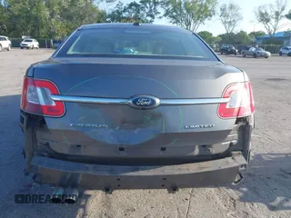 2011 Ford Taurus Limited with VIN 1FAHP2FW3BG117688, listed as a IAAI auction lot 41974469 with 215,036 mi miles and . Bid and sale history available at carsss.com. Image 6.