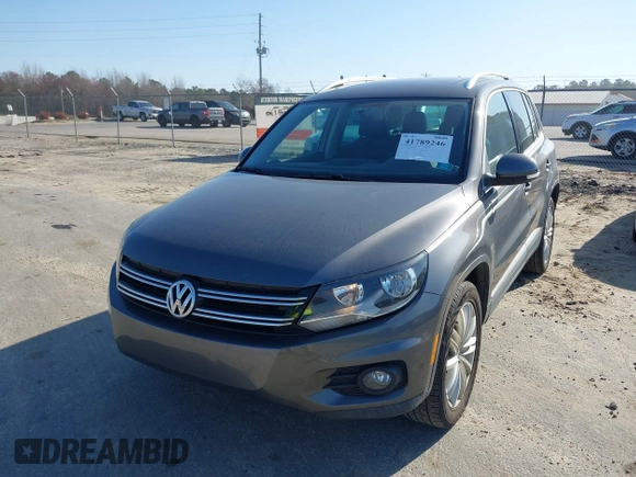 2012 Volkswagen Tiguan SE with VIN WVGAV7AX5CW000275, listed as a IAAI auction lot 41789246 with 123,618 mi miles and . Bid and sale history available at DreamBid. Image 17.