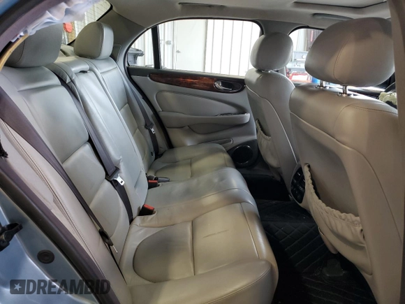 2004 Jaguar XJ with VIN SAJWA71C34SG29145, listed as a Copart auction lot 45932635 with 133,888 mi miles and Salvage Title. Bid and sale history available at carsss.com. Image 10.