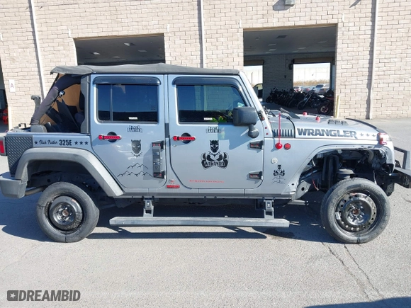 2015 Jeep Wrangler Unlimited Sport with VIN 1C4BJWDG7FL587014, listed as a IAAI auction lot 40641034 with 81,045 mi miles. Bid and sale history available at carsss.com. Image 14.