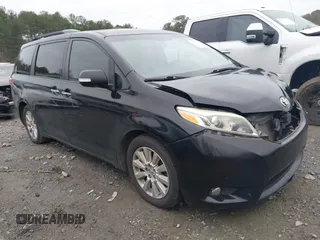 2015 Toyota Sienna XLE with VIN 5TDYK3DC1FS668107, listed as a IAAI auction lot 41079000 with 154,681 mi miles. Bid and sale history available at carsss.com. Image 1.