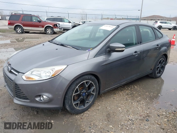 2012 Ford Focus SE with VIN 1FAHP3F21CL415006, listed as a IAAI auction lot 42073643 with 168,516 mi miles. Bid and sale history available at carsss.com. Image 2.