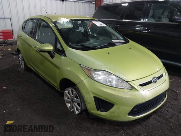 2013 Ford Fiesta SE with VIN 3FADP4EJ6DM150399, listed as a IAAI auction lot 41734742 with 139,056 mi miles. Bid and sale history available at carsss.com. Image 6.