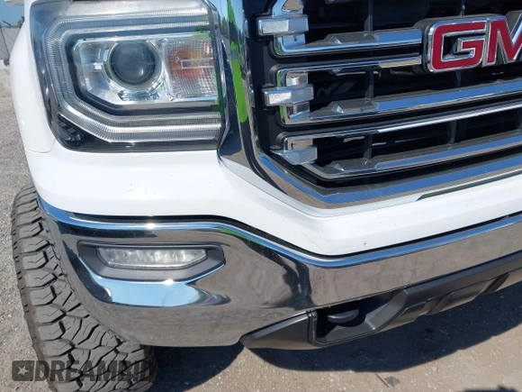 2017 GMC Sierra 1500 SLT z VIN 3GTU2NEC2HG474079, wystawiony jako IAAI lot #41899673 z przebiegiem 104 033 mil mil oraz . Historia ofert i sprzedaży dostępna na DreamBid. Obrazek 6.