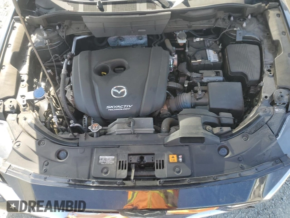 2018 Mazda CX-5 Grand Touring z VIN JM3KFBDM0J0399985, wystawiony jako Copart lot #54097665 z przebiegiem 45 344 mil mil oraz Szkoda całkowita • Salvage title. Historia ofert i sprzedaży dostępna na DreamBid. Obrazek 12.
