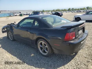 2004 Ford Mustang GT Deluxe z VIN 1FAFP42X64F137315, wystawiony jako Copart lot #52577925 z przebiegiem 210 557 mil mil oraz Szkoda całkowita • Salvage title. Historia ofert i sprzedaży dostępna na DreamBid. Obrazek 2.