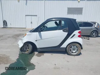 2009 Smart fortwo Pure with VIN WMEEJ31XX9K302737, listed as a IAAI auction lot 42124550 with 43,610 mi miles and . Bid and sale history available at DreamBid. Image 14.