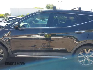 2018 Hyundai Santa Fe Ultimate with VIN 5NMZW4LA4JH054307, listed as a IAAI auction lot 42532426 with 148,299 mi miles and . Bid and sale history available at DreamBid. Image 14.