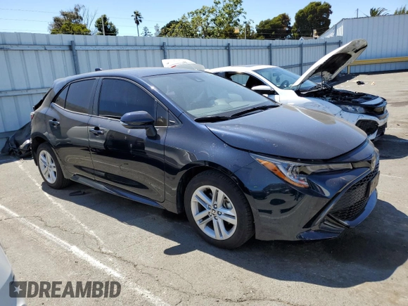 2022 Toyota Corolla Hatchback SE with VIN JTND4MBEXN3186220, listed as a Copart auction lot 63149424 with 15,331 mi miles and Salvage Title. Bid and sale history available at carsss.com. Image 4.