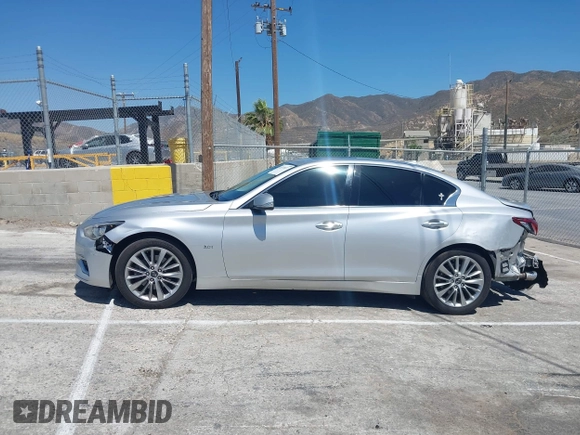 2020 Infiniti Q50 Luxe with VIN JN1EV7AP0LM203949, listed as a IAAI auction lot 42520077 with 57,531 mi miles and . Bid and sale history available at DreamBid. Image 14.