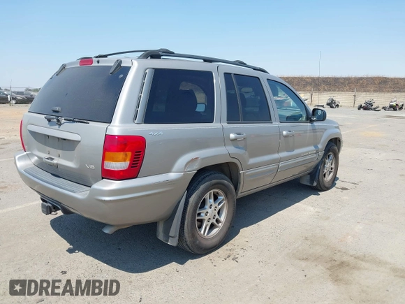 2000 Jeep Grand Cherokee Limited with VIN 1J4GW58N5YC361724, listed as a IAAI auction lot 42722980 with 136,590 mi miles and . Bid and sale history available at DreamBid. Image 4.
