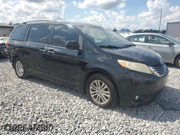 2015 Toyota Sienna XLE with VIN 5TDYK3DC2FS532715, listed as a Copart auction lot 62298295 with 151,583 mi miles and Salvage title. Bid and sale history available at DreamBid. Image 4.