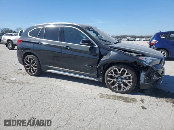 2021 BMW X1 xDrive28i with VIN WBXJG9C06M5U39389, listed as a Copart auction lot 46702675 with 39,594 mi miles and Salvage Title. Bid and sale history available at carsss.com. Image 4.
