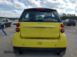 2010 Smart fortwo Pure z VIN WMEEJ3BAXAK371054, wystawiony jako Copart lot #71819294 z przebiegiem 103 177 mil mil oraz Szkoda całkowita • Salvage title. Historia ofert i sprzedaży dostępna na DreamBid. Obrazek 6.