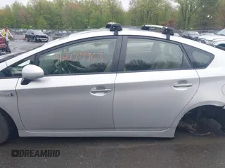 2012 Toyota Prius with VIN JTDKN3DP2C3004184, listed as a IAAI auction lot 42179963 with 210,815 mi miles and . Bid and sale history available at DreamBid. Image 14.