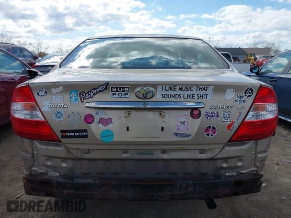 2003 Toyota Camry LE with VIN 4T1BE32KX3U123873, listed as a IAAI auction lot 42085492 with 166,901 mi miles and . Bid and sale history available at DreamBid. Image 16.