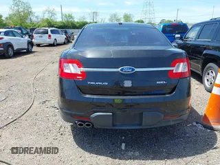 2011 Ford Taurus SEL with VIN 1FAHP2EW6BG127102, listed as a IAAI auction lot 42131123 with 168,965 mi miles. Bid and sale history available at carsss.com. Image 16.