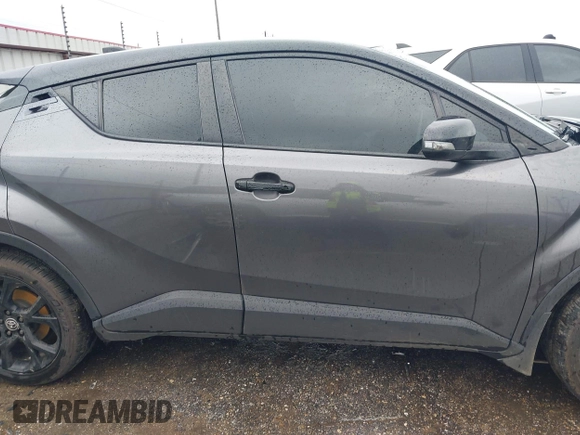 2021 Toyota C-HR LE with VIN JTNKHMBX0M1129080, listed as a IAAI auction lot 41321604 with 52,916 mi miles. Bid and sale history available at carsss.com. Image 13.