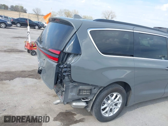 2022 Chrysler Pacifica Touring L z VIN 2C4RC1BG1NR150162, wystawiony jako IAAI lot #42125636 z przebiegiem 41 986 mil mil oraz . Historia ofert i sprzedaży dostępna na DreamBid. Obrazek 19.