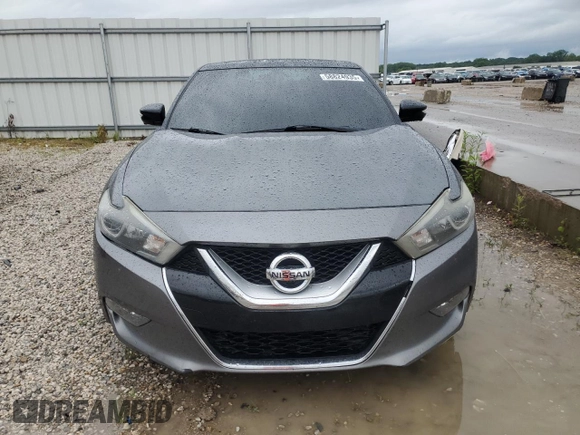 2016 Nissan Maxima SR с VIN 1N4AA6APXGC427880, выставлен на аукционе Copart как лот 58824935 с пробегом 144 050 миль миль и Списание • Salvage title. История ставок и продаж доступна на DreamBid. Изображение 5.