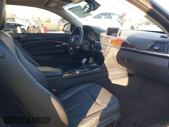 2014 BMW 4 Series 428i with VIN WBA3N7C50EF718812, listed as a IAAI auction lot 41349128 with 67,581 mi miles and . Bid and sale history available at carsss.com. Image 5.