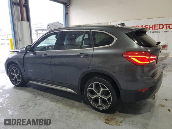 2017 BMW X1 xDrive28i with VIN WBXHT3C38H5F73265, listed as a Copart auction lot 45148825 with 95,850 mi miles and Salvage Title. Bid and sale history available at carsss.com. Image 2.